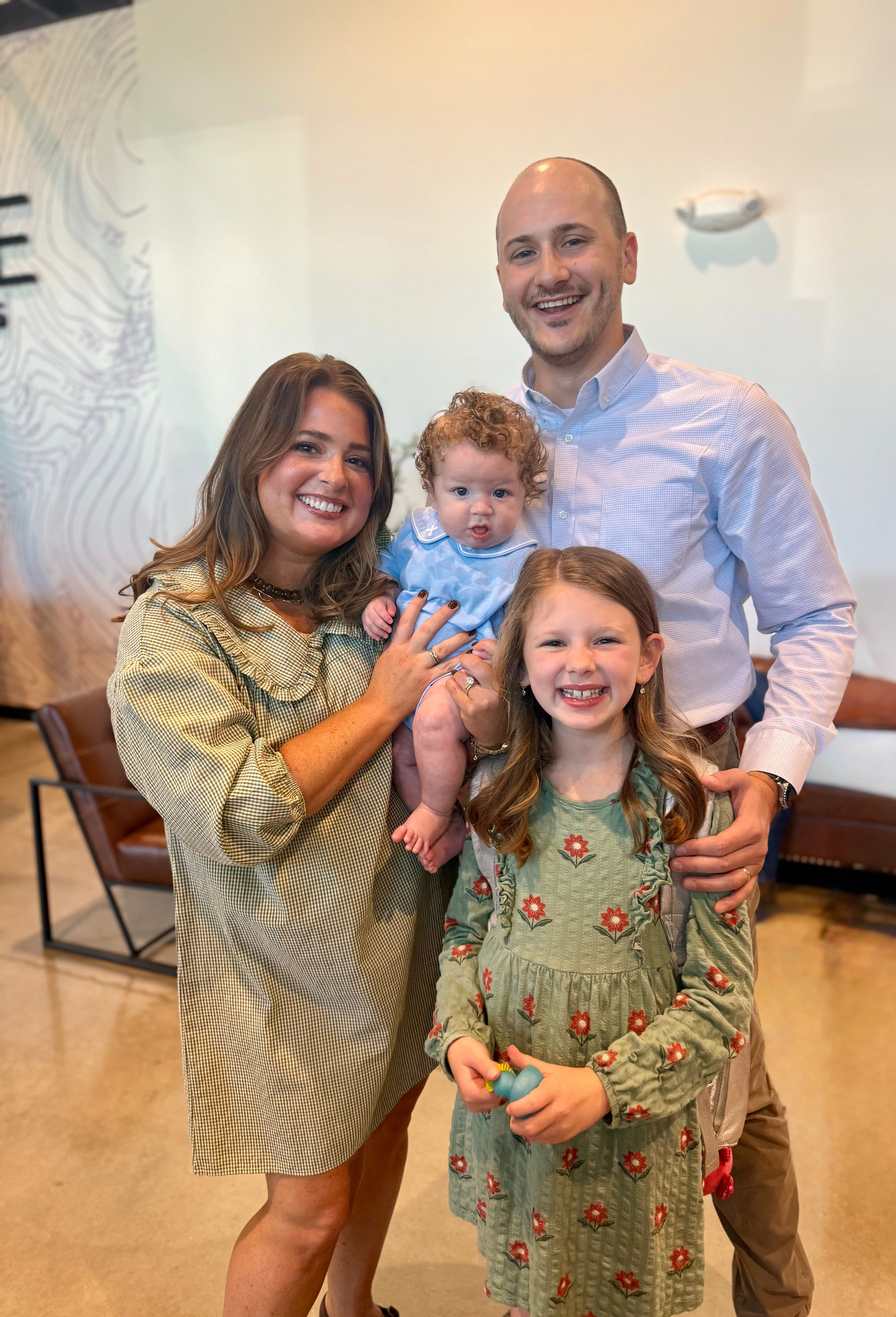 Mason Coy with his wife and children